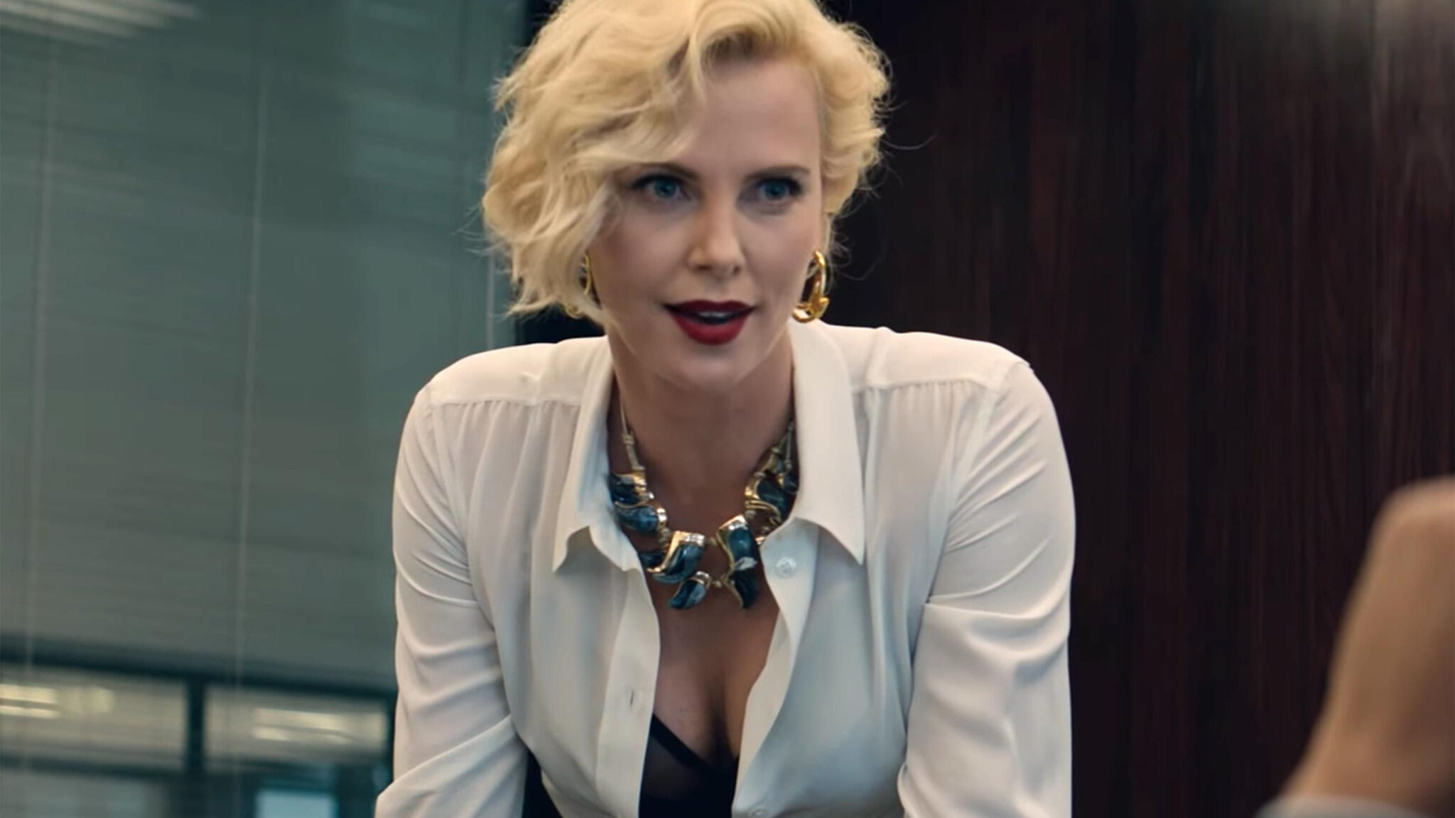 See Charlize Theron As A Frizzy Haired Redhead In Her New Fantasy Movie Giant Freakin Robot